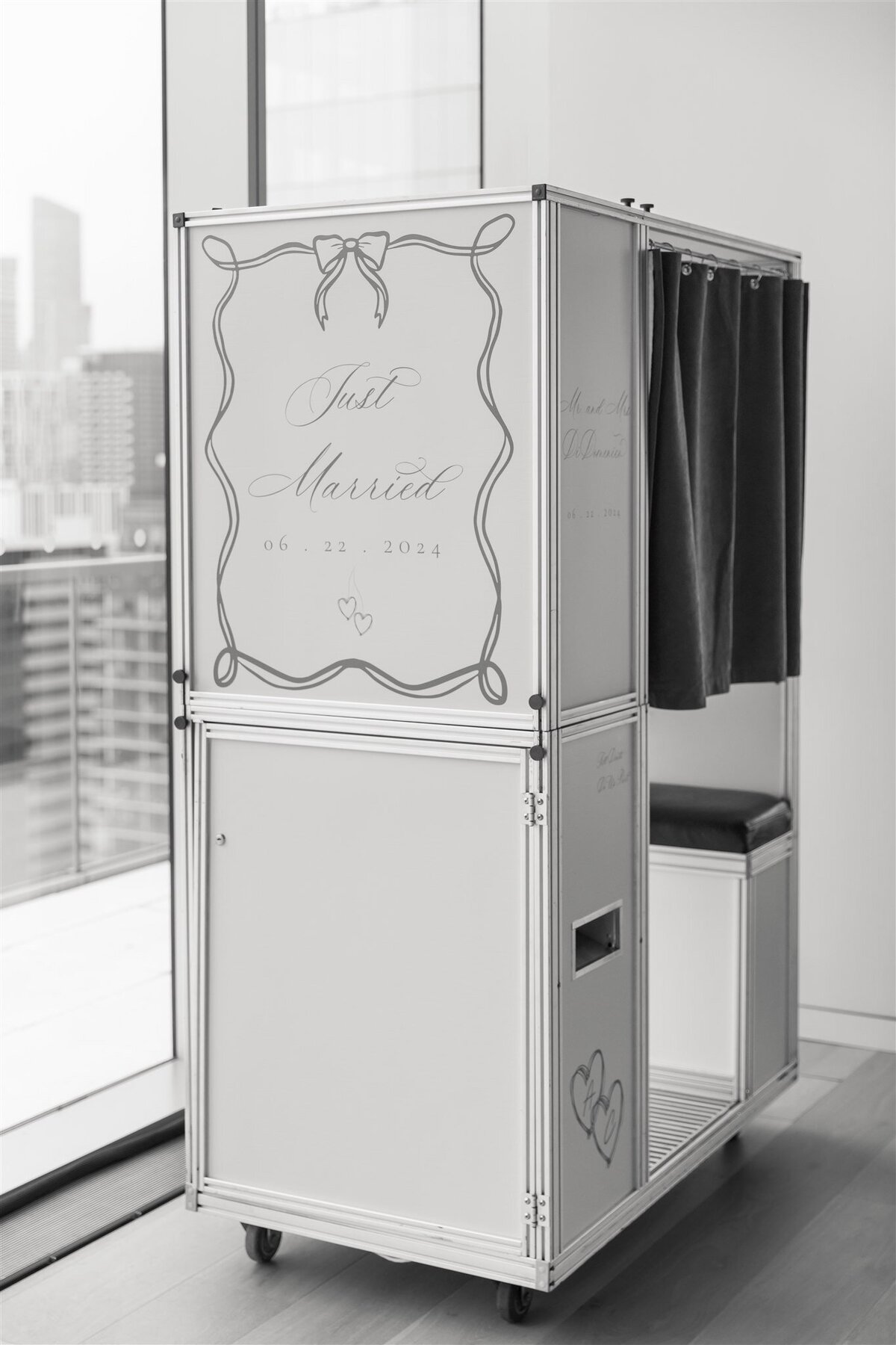 Custom photo booth vinyl wrap with couples' wedding date and "Just Married"