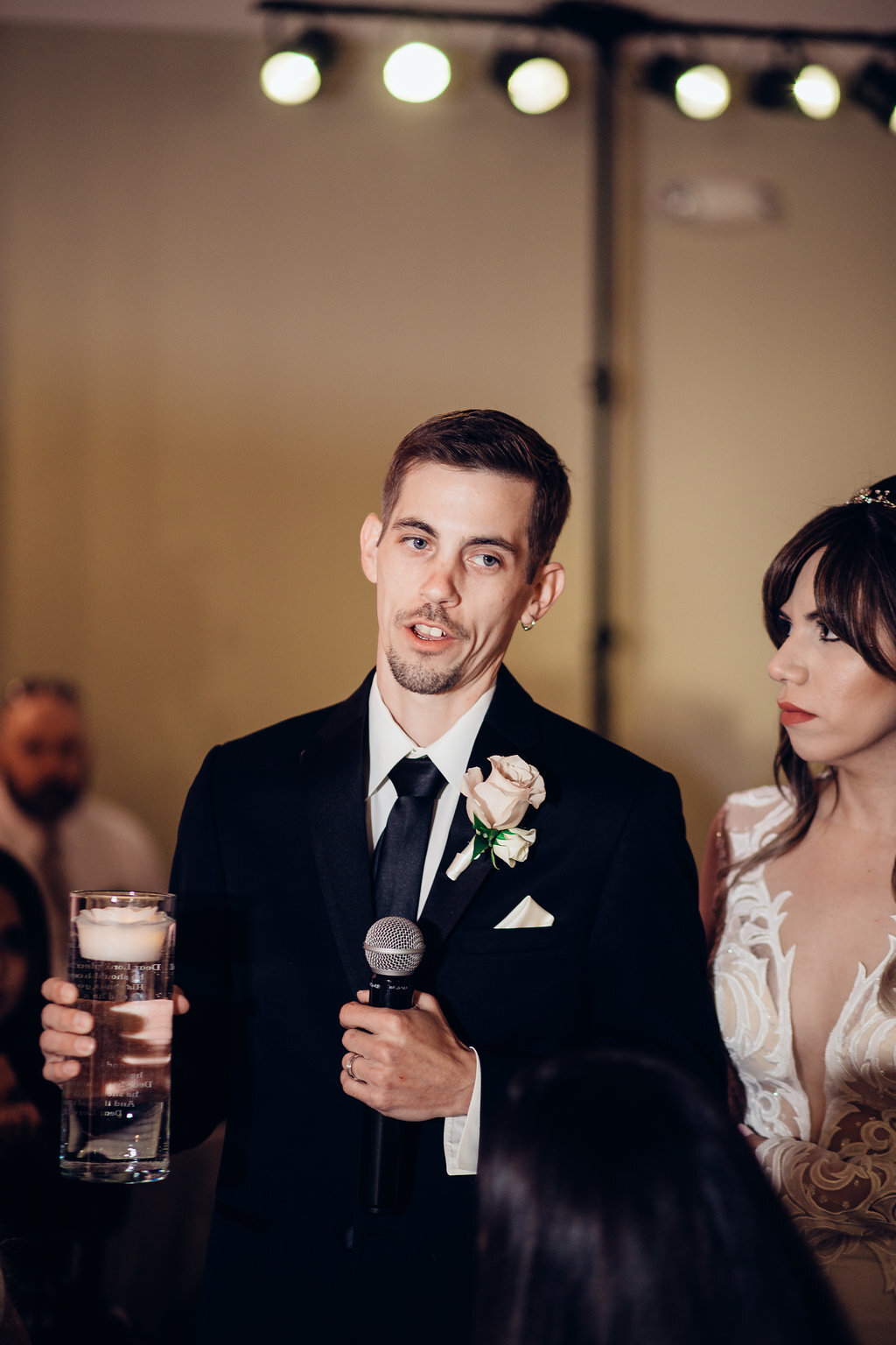 Wedding Photograph Of Bride Looking At Her Groom  Speaking Los Angeles