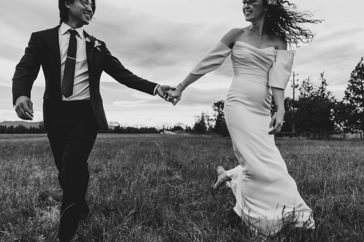couple-holding-hands-on-wedding-day