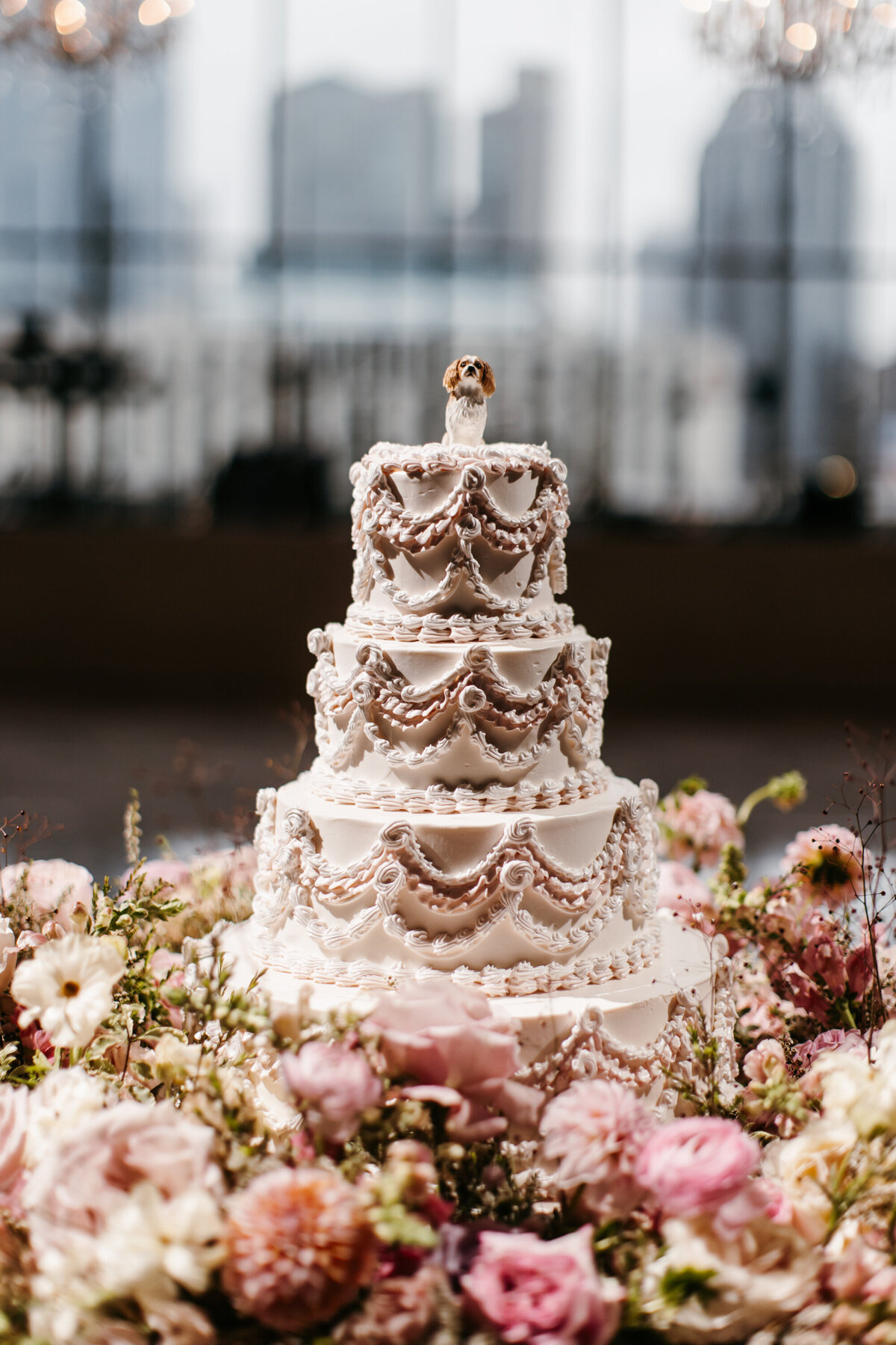 vintage wedding cake with fresh flowers