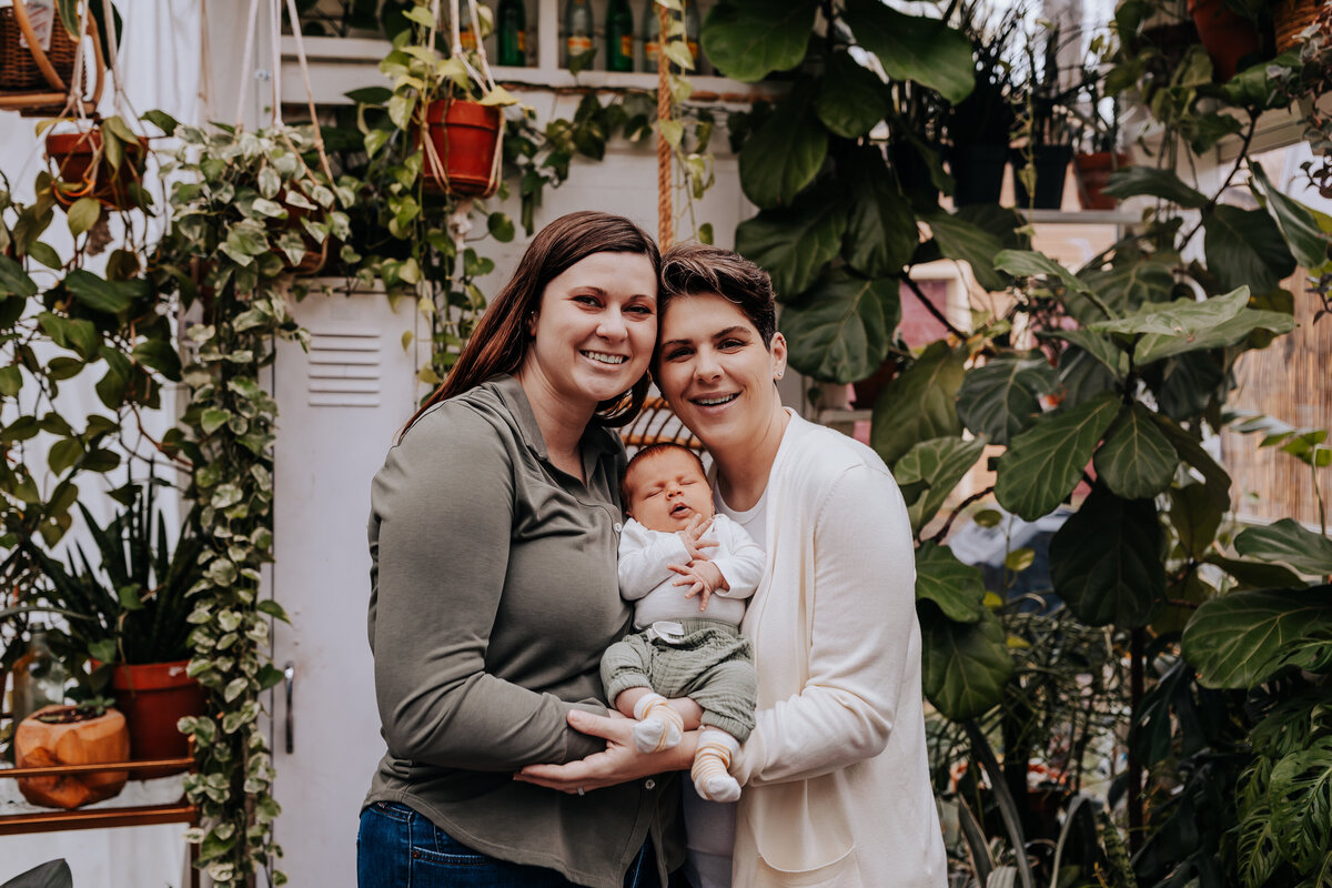 Nashville newborn photographer captures couple holding newborn baby