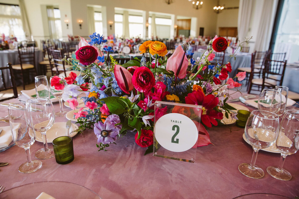 Blush velvet table linen with acrylic seat number