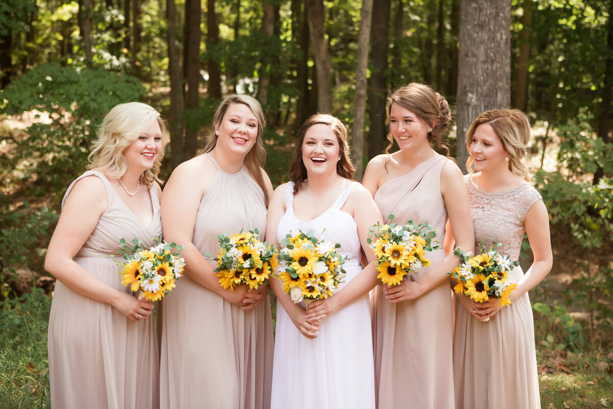 bridesmaids with sunflower bouquet