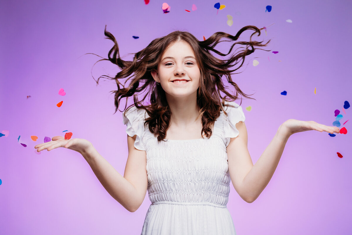 girl-tossing-confetti
