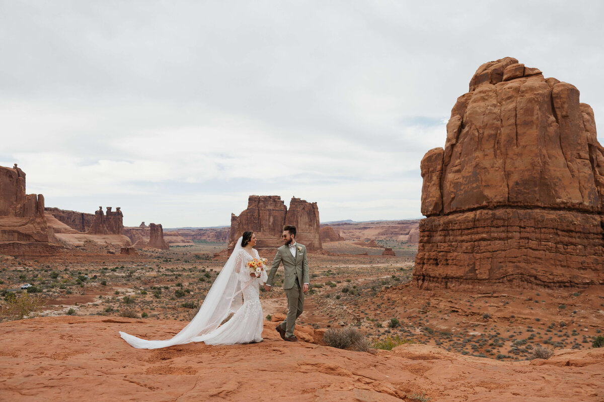 bride and groom in moab