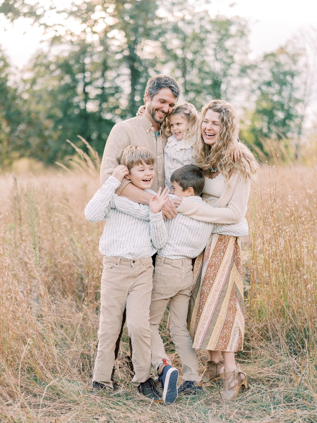 Family embracing during fall family session