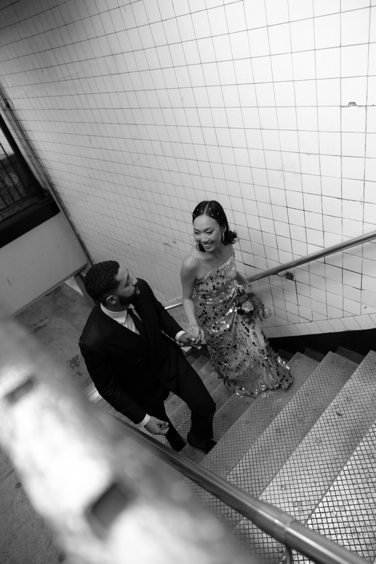 Modern, urban editorial elopement session on the NYC subway, capturing bold style and romantic vibes.