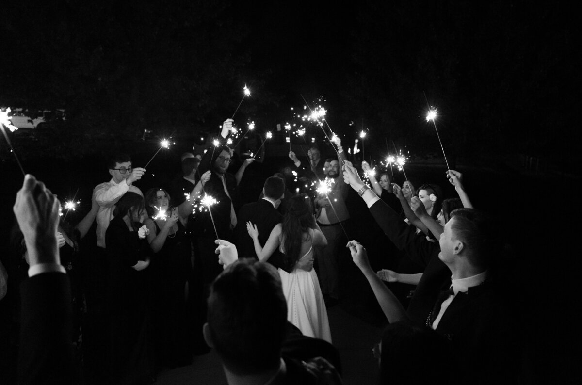 bride and groom have a sparkler exit on their wedding night