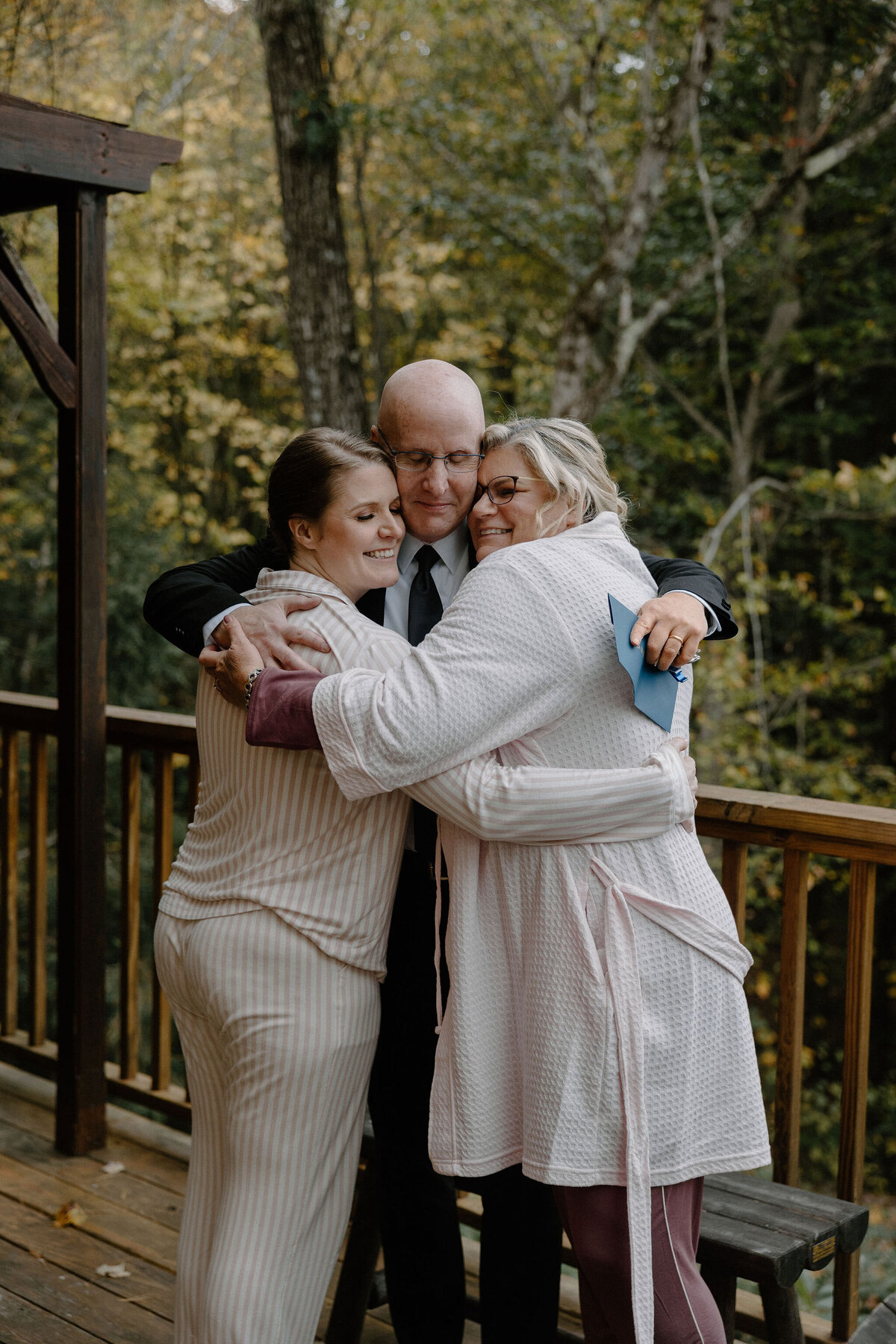 bride hugging family