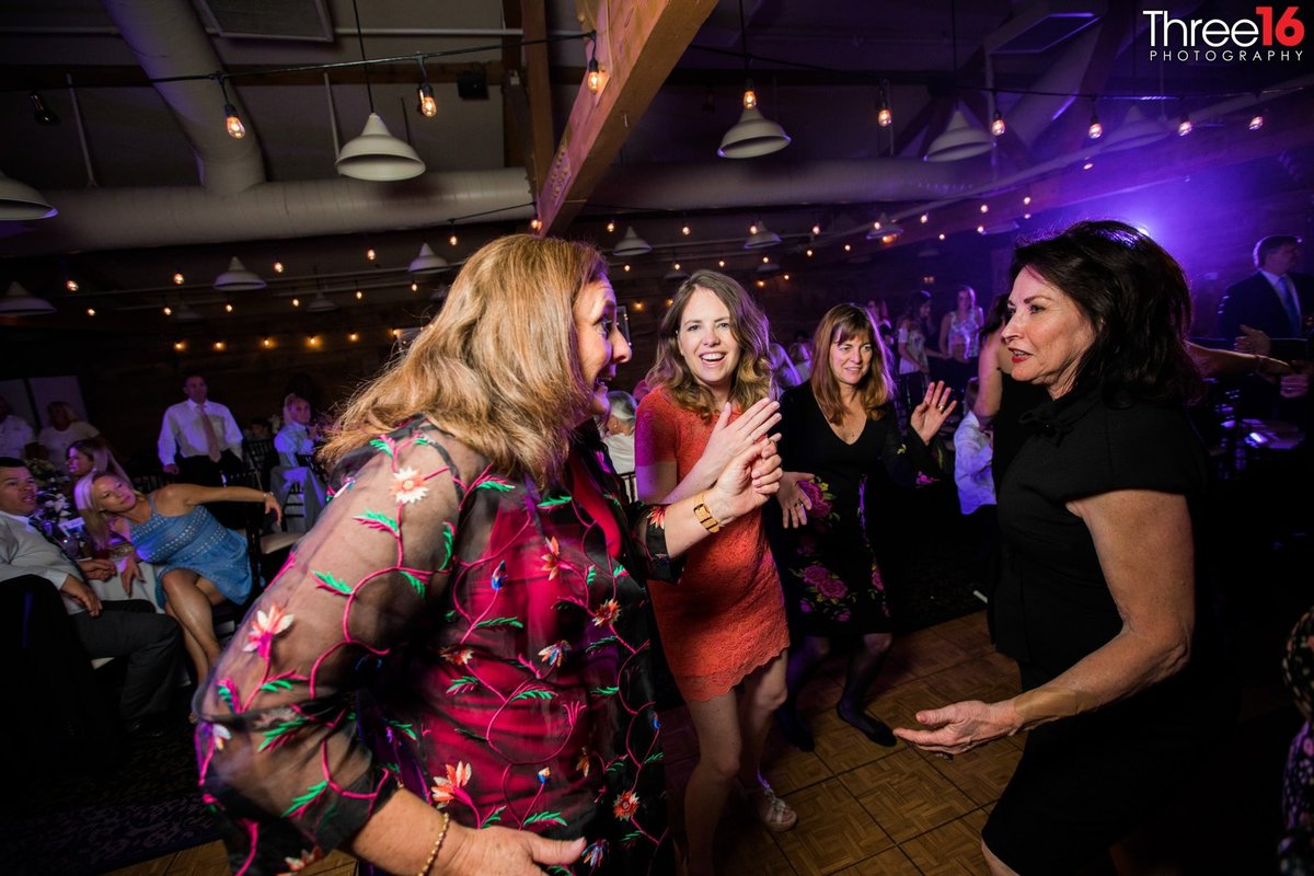 Wedding Guests dance the night away at the reception