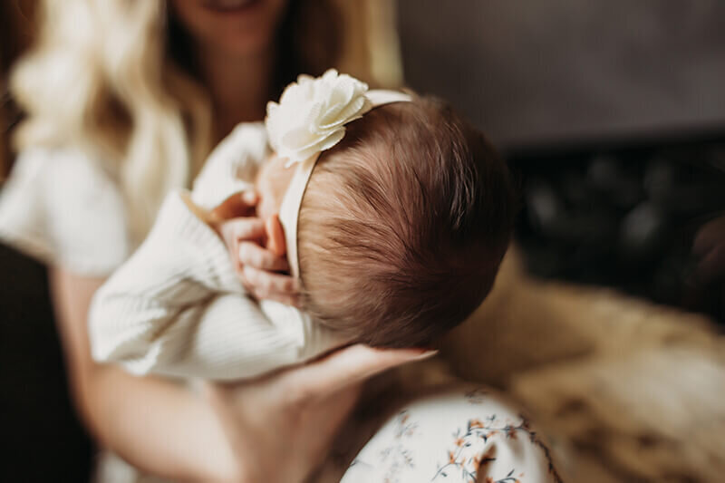 detail close up of newborn baby girl hair from the top