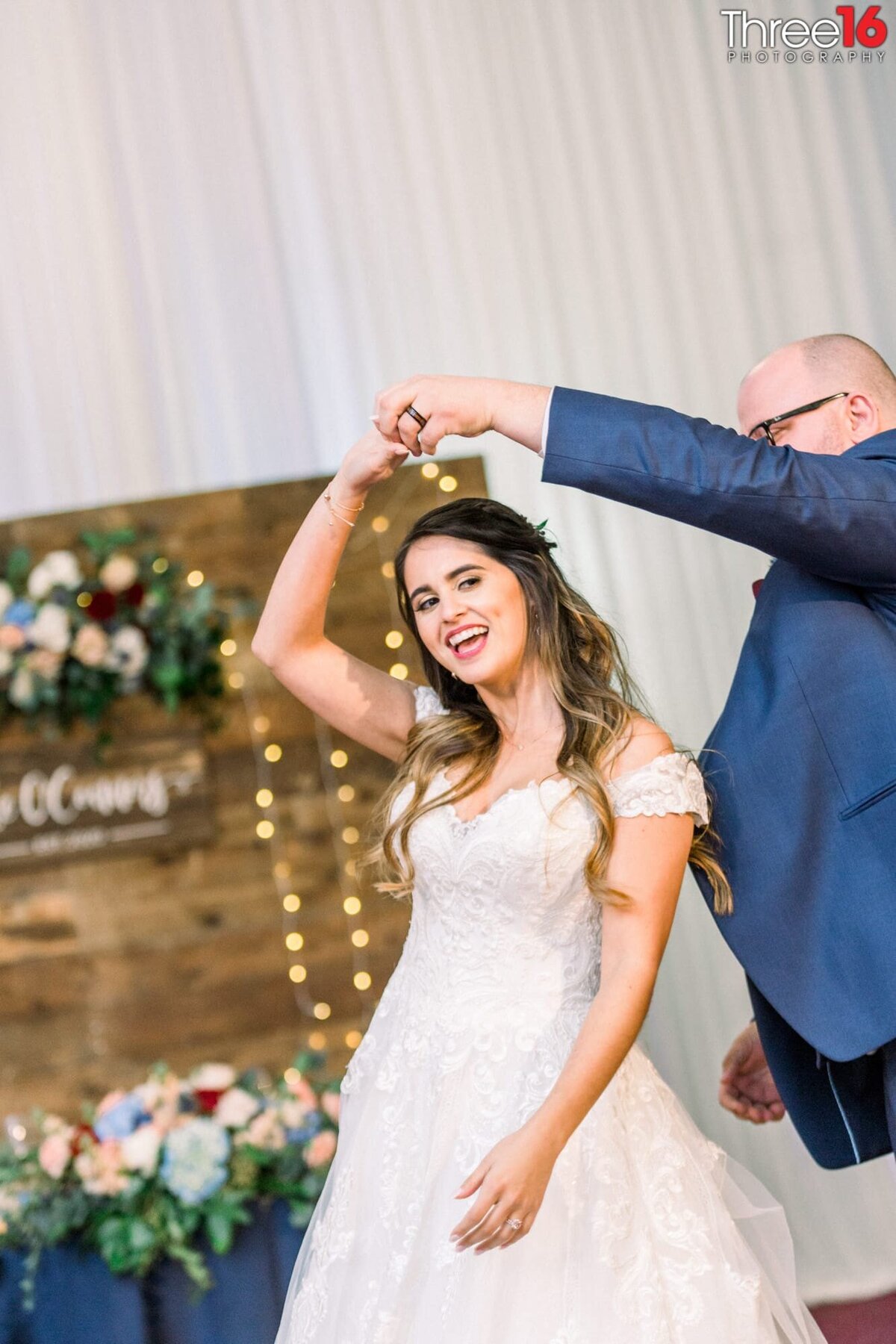 Groom spins his Bride during their first dance
