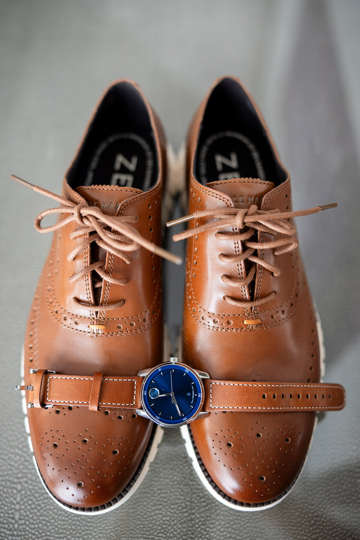 Picture Cole Haan leather shoes and Movado bold men's watch 