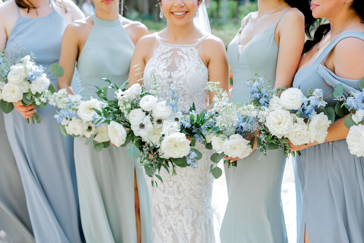 Bride and bridesmaids holding their wedding bouquets