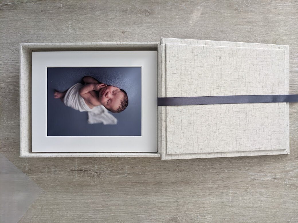 Printed 5x7 baby boy newborn portrait matted in  a beautiful white box
