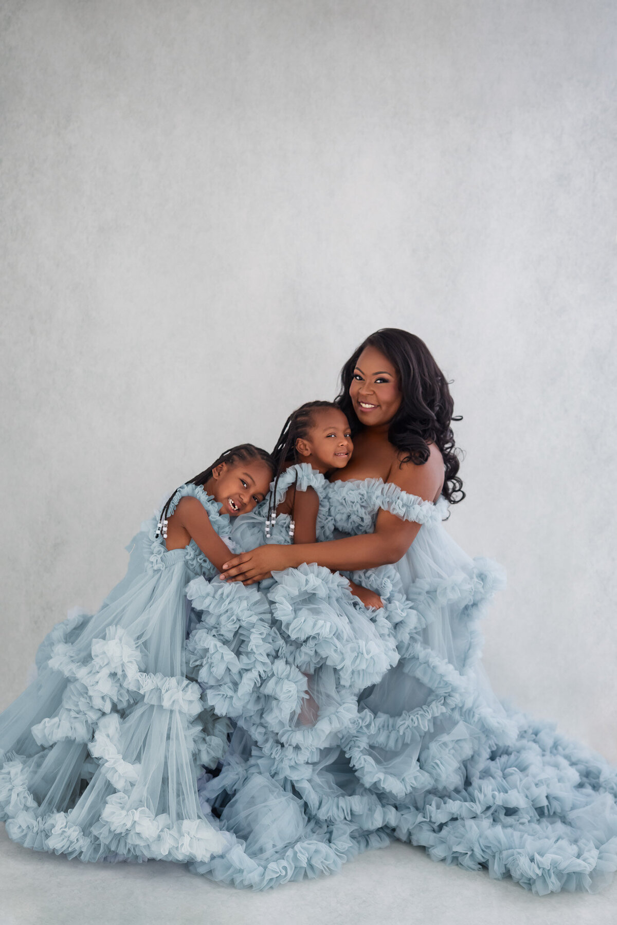 orlando maternity photographer with blue dresses