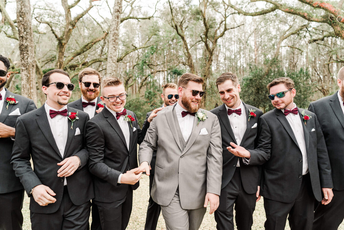 The-Elizabeth-Grand-Bay-Mobile-Alabama-Wedding-Photographer-Karen-Trevor-Groomsmen-Walking-Sunglasses