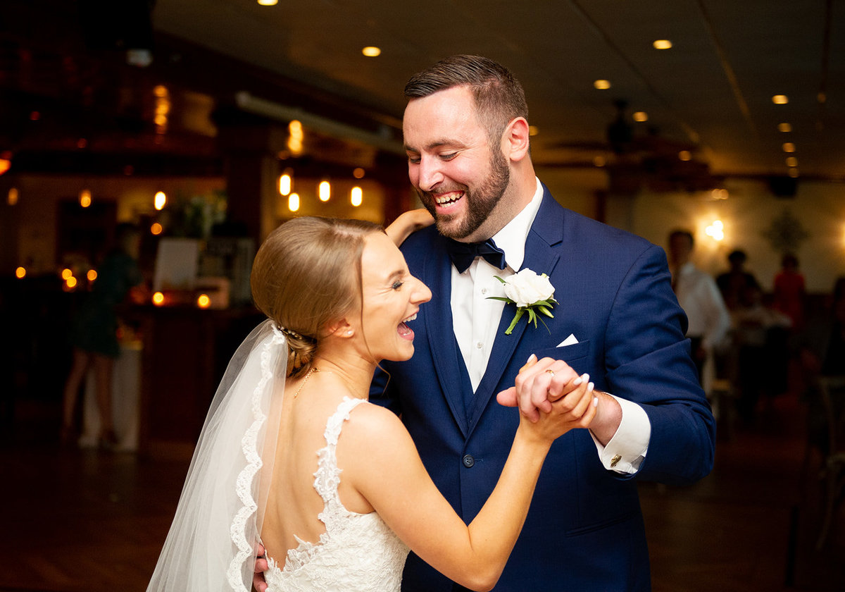couple laughs during first dance