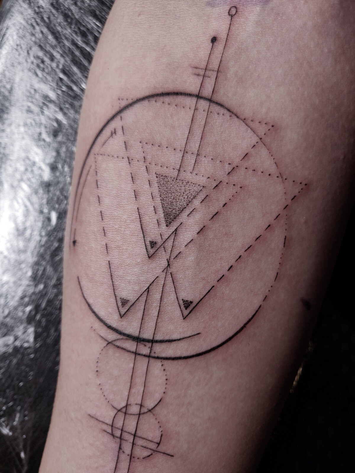 triangle tattoo, concept tattoo, fine line tattoo, minimal tattoo, geometric tattoo