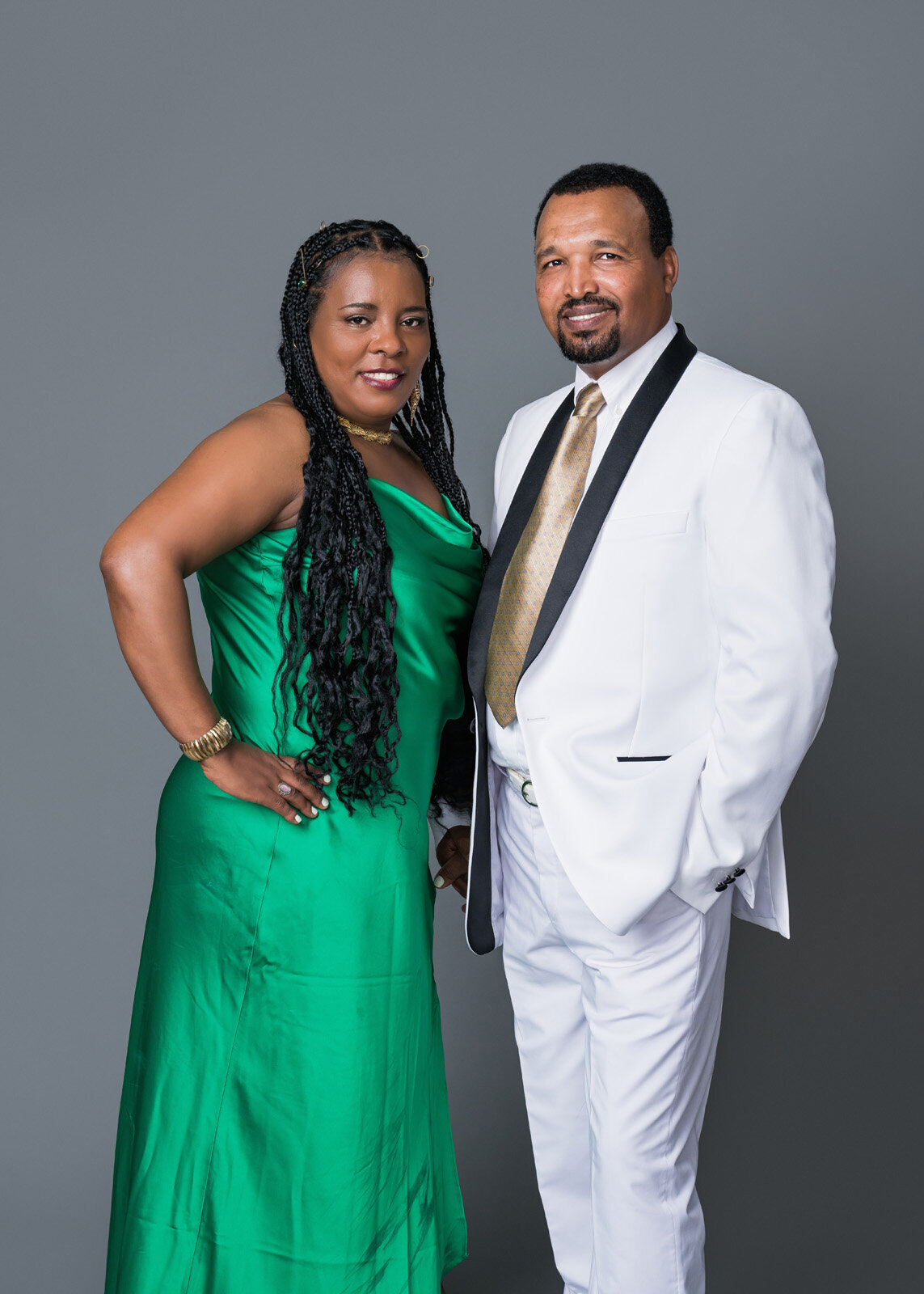 Elegant Couple Portrait in Formal Attire with Gray Background-30