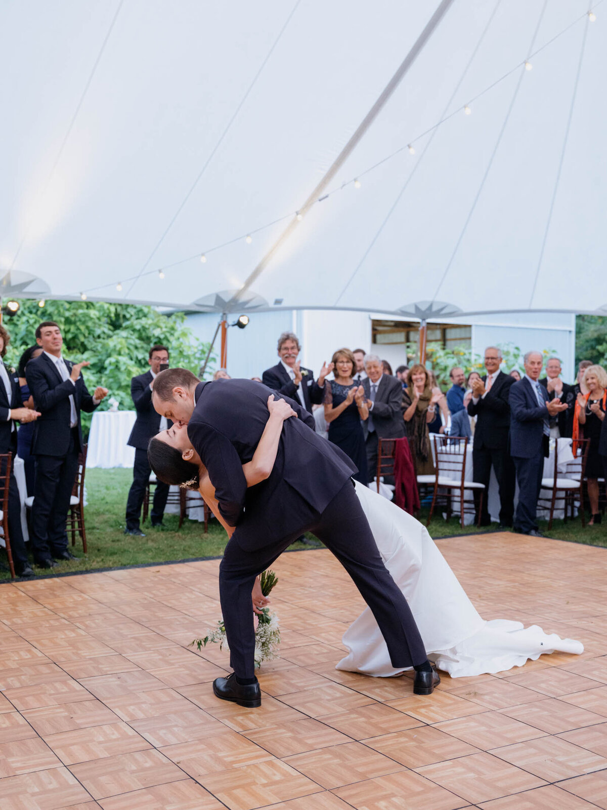 Elegant tented reception at private estate wedding.