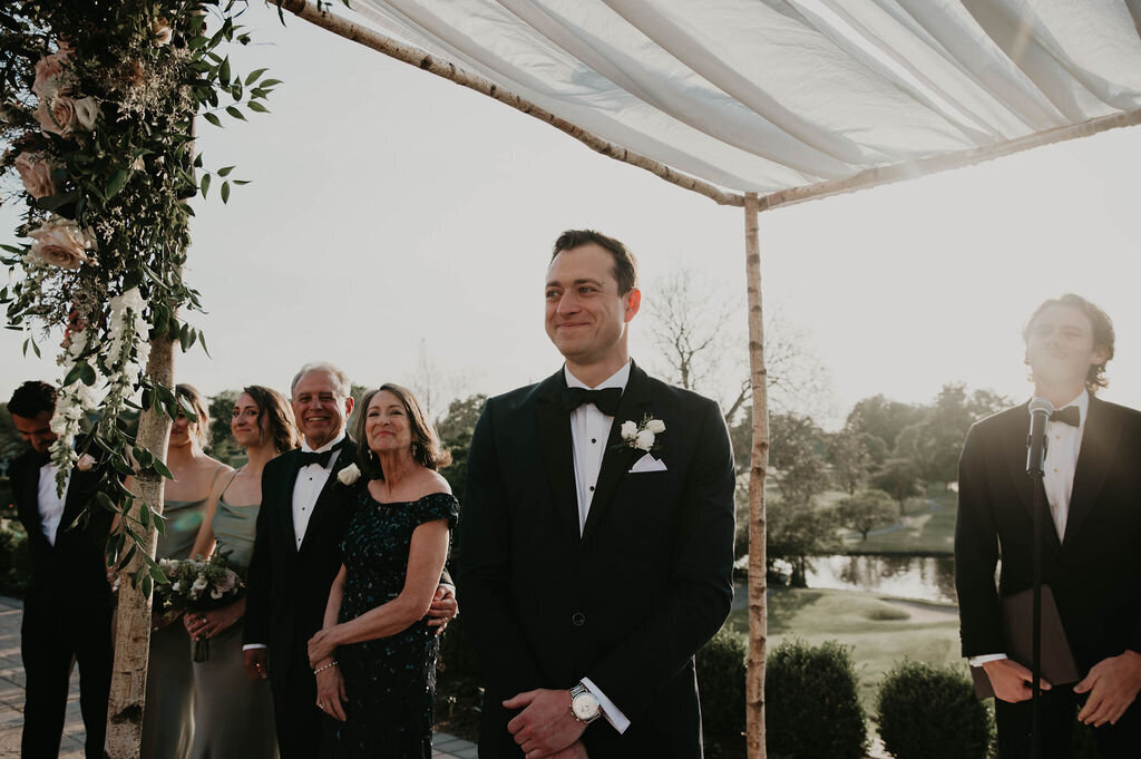 groom-ceremony-brooklake-country-club