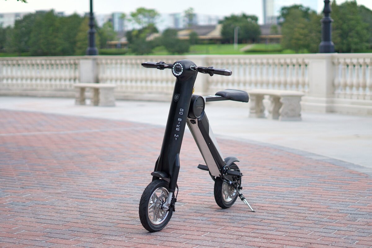 Red Go-Bike M2 & White Go-Bike M1 at the park; V&D Electric Bikes