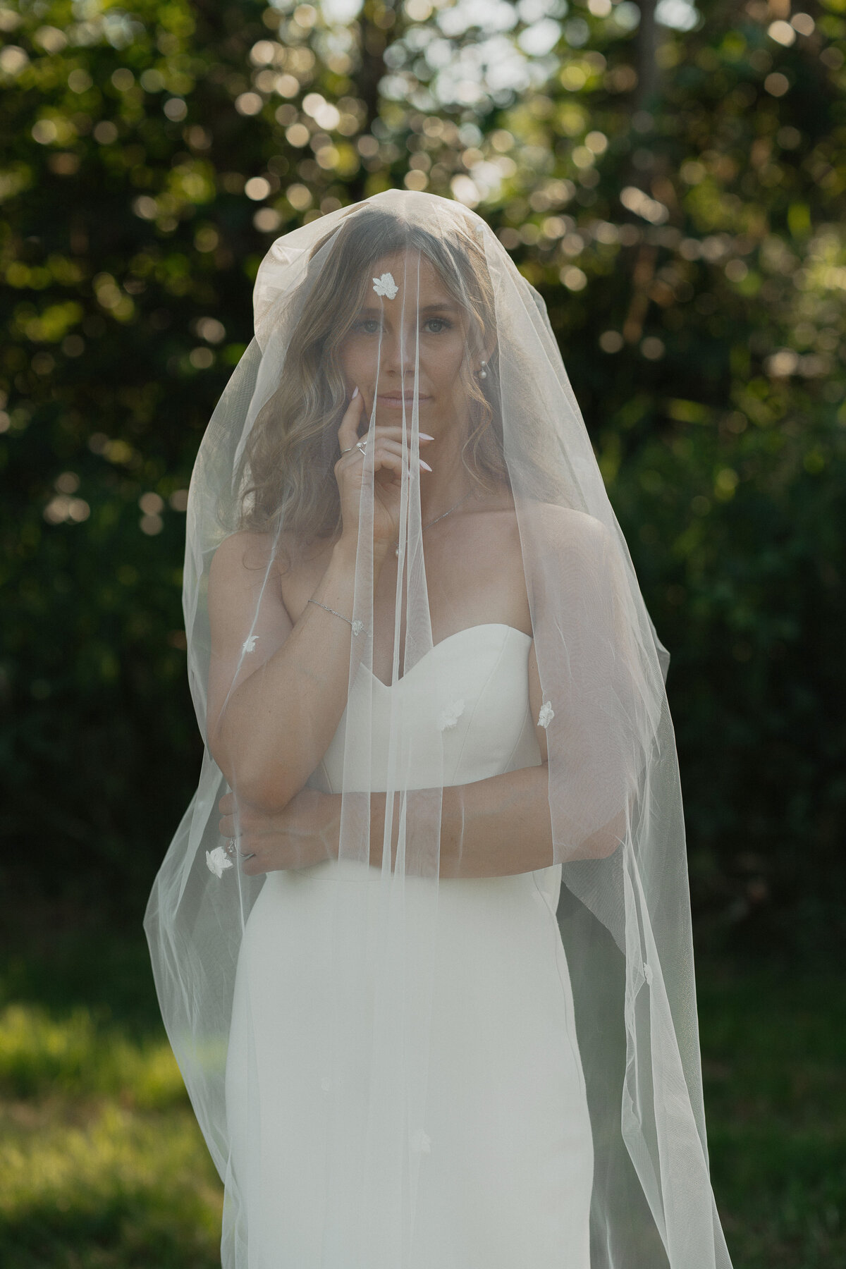 Bride under her veil during her wedding portraits in Comox by Latitude 49 Photography