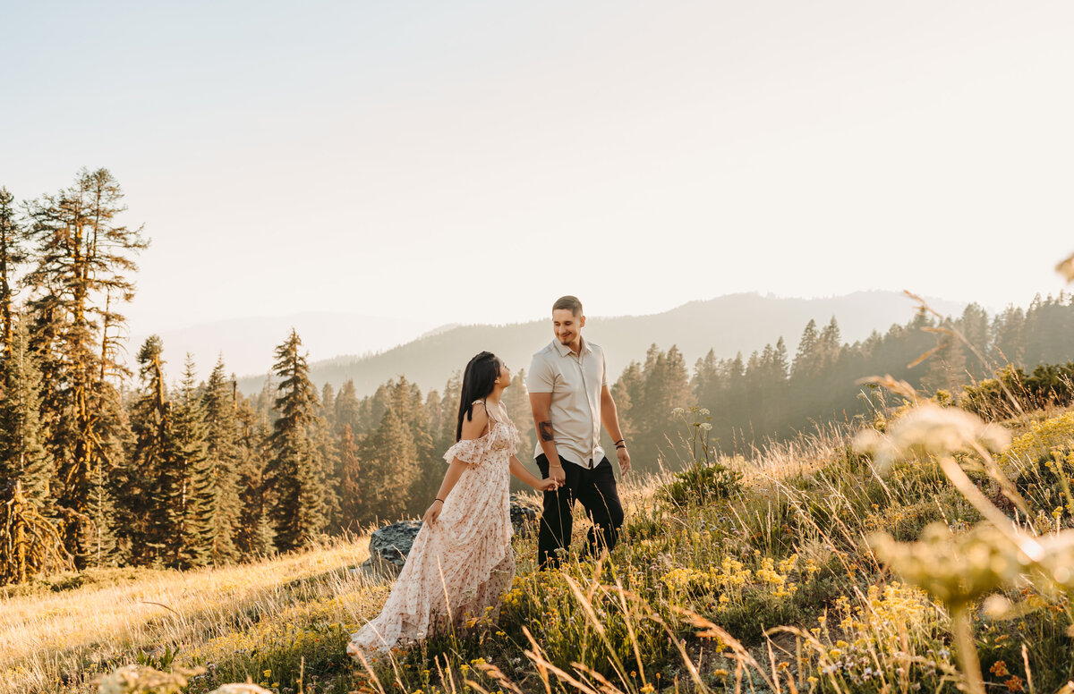 Couple Holding Hands in a Field | Photography by Jocelyn