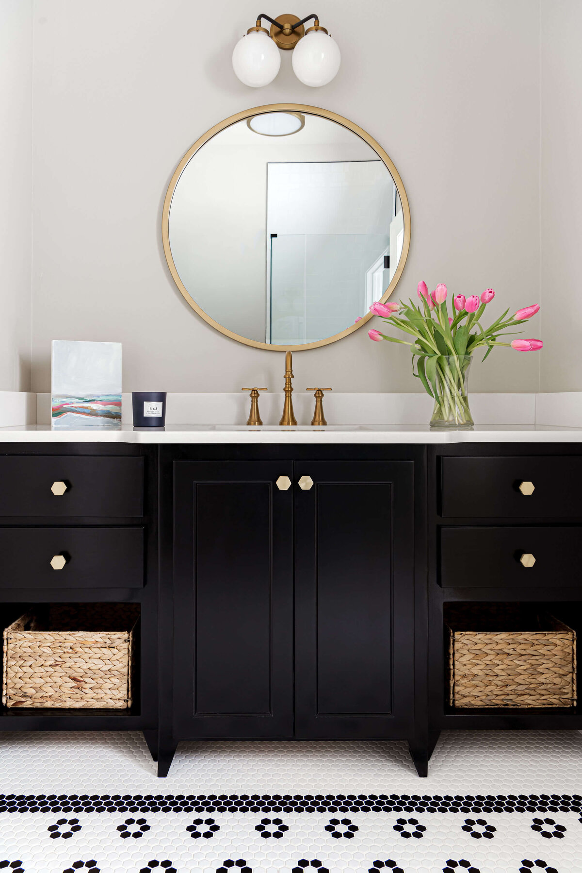 sweet southern home windmill gold circle mirror and dark brown vanity in bathroom