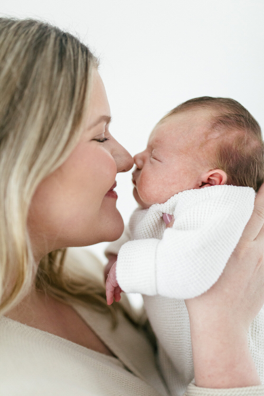 Mum and baby touch noses