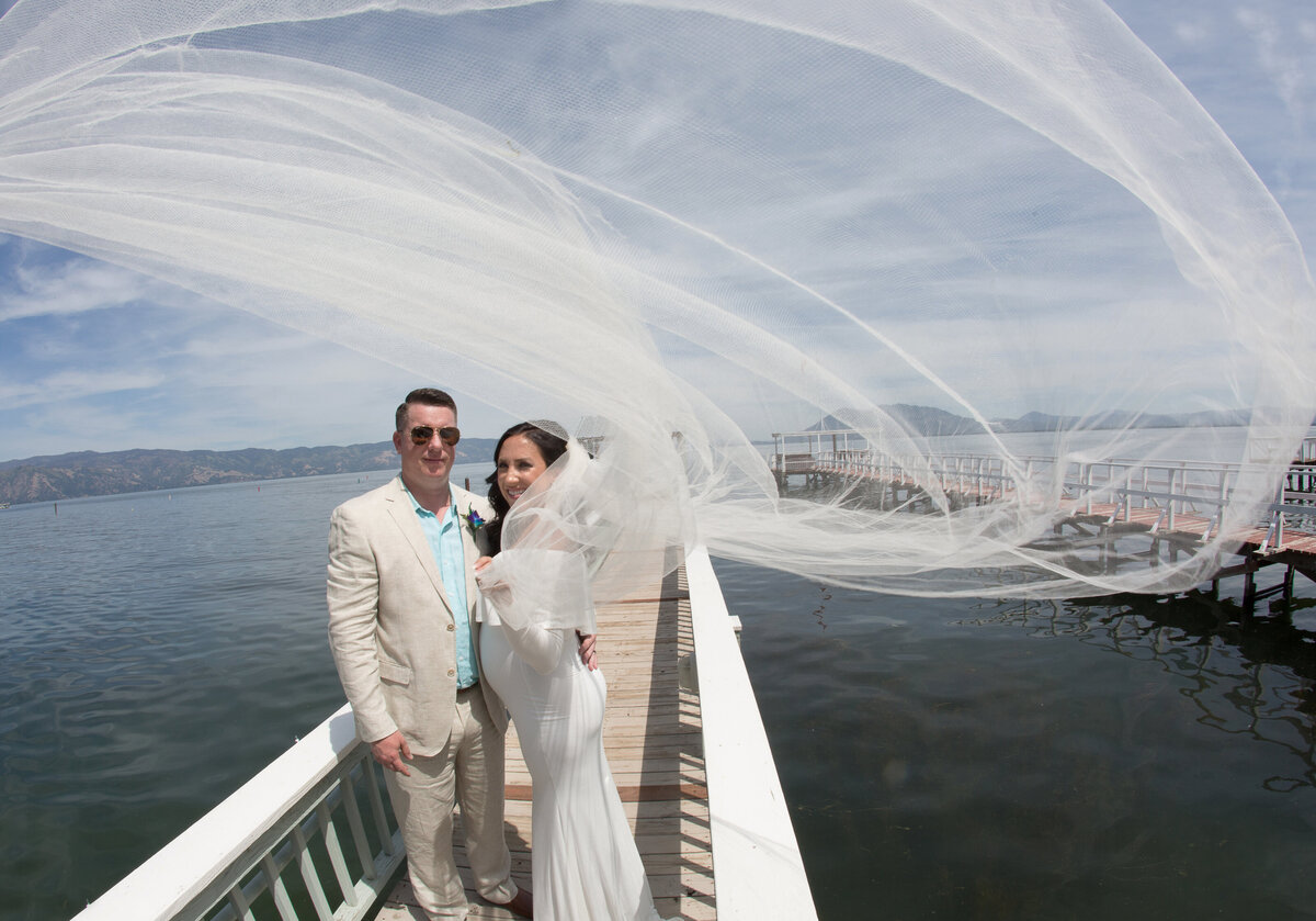 brides veil blowing during romantics