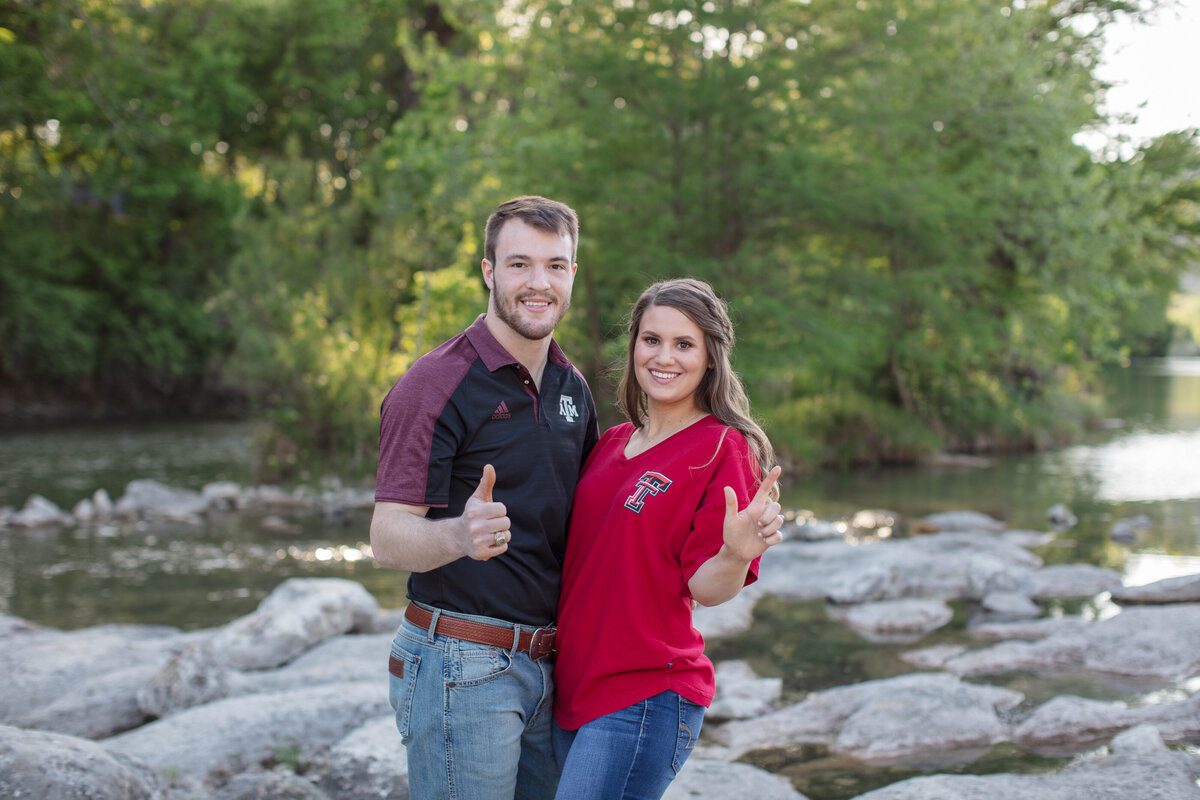 Aggie groom Red Raider bride wedding engagement by Guadalupe River in New Braunfels