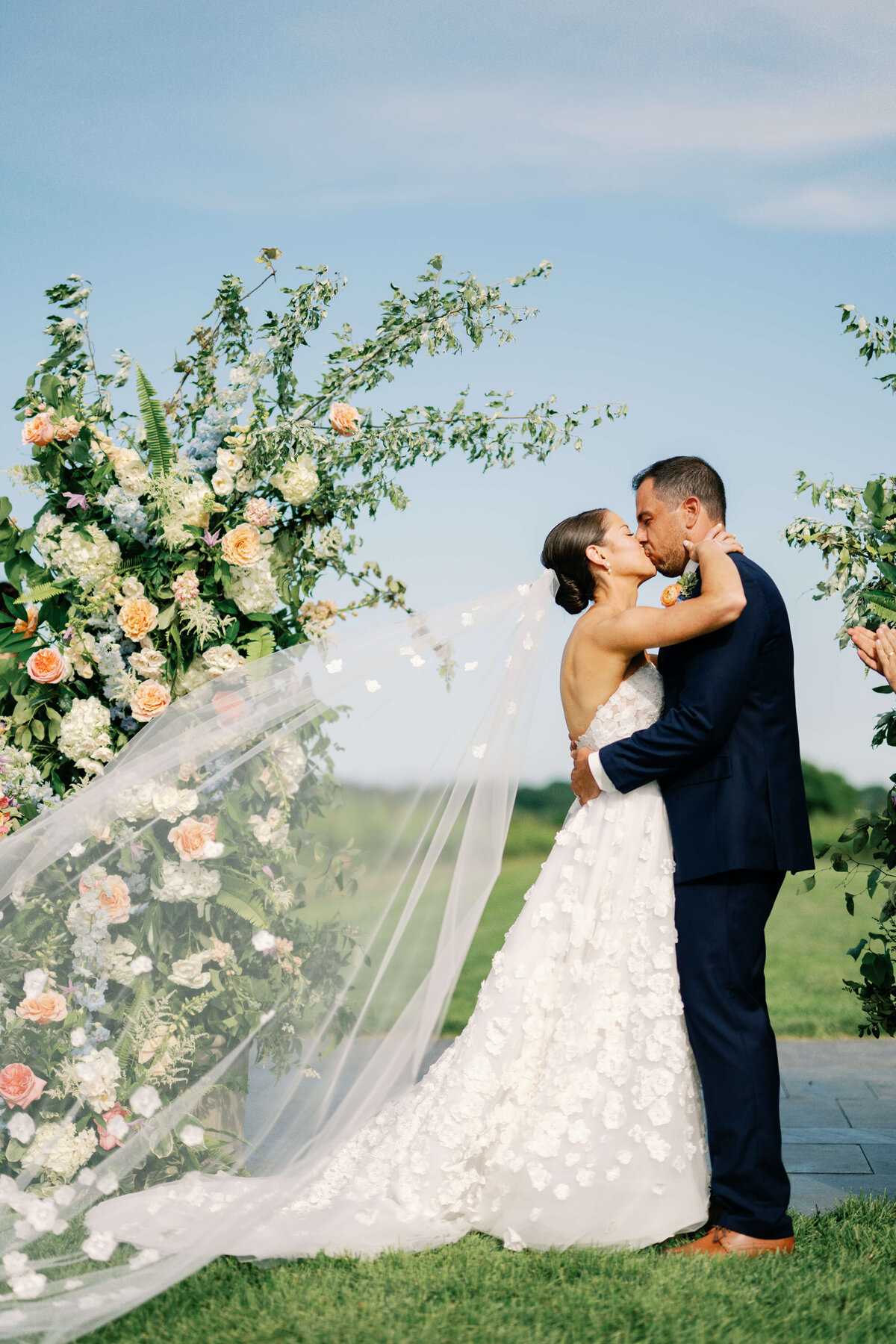 Bride and groom kissing