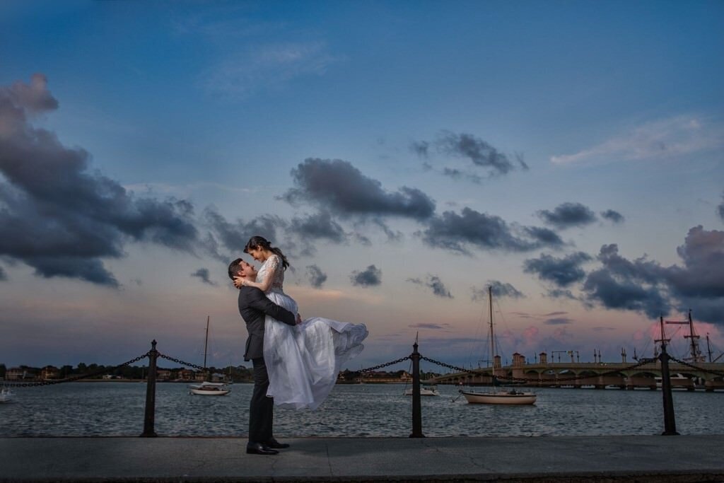 st augustine wedding photographers rob and jill futrell photographed this couple on the bayfront by the bridge of lions