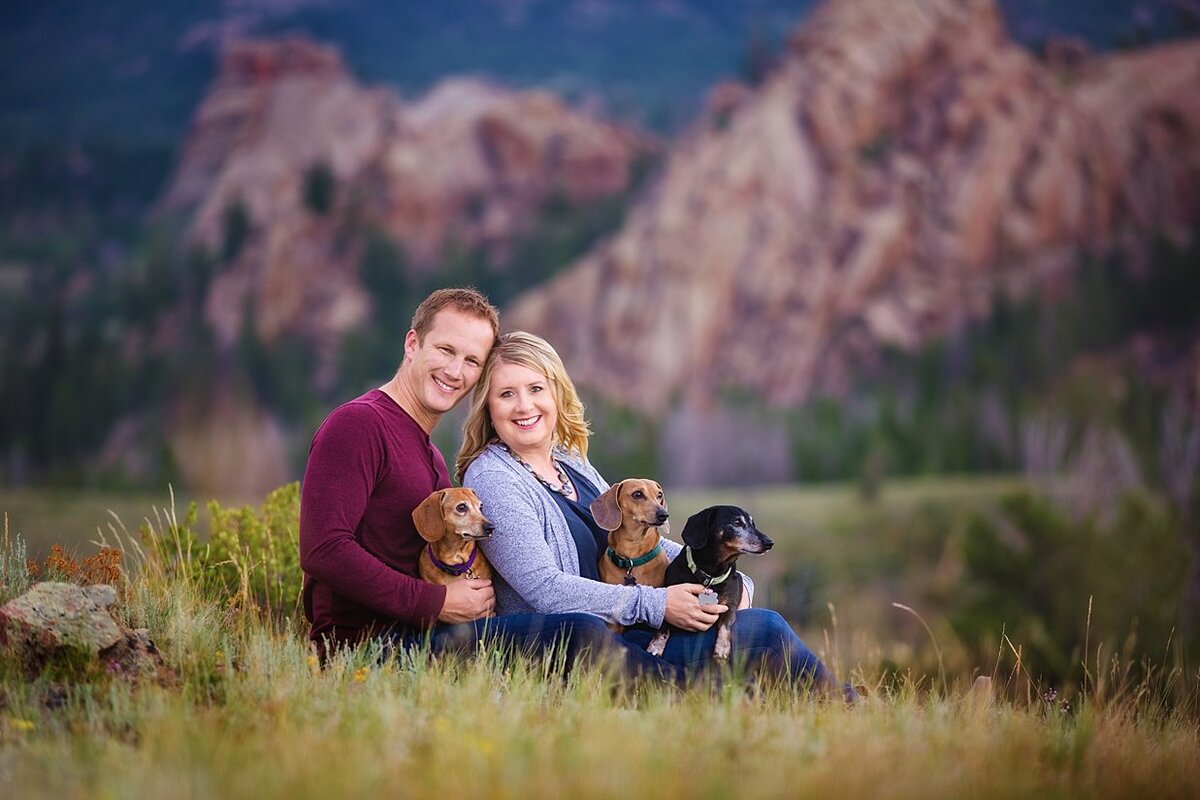 Photography of couple at sunset at Vedauwoo with their dogs