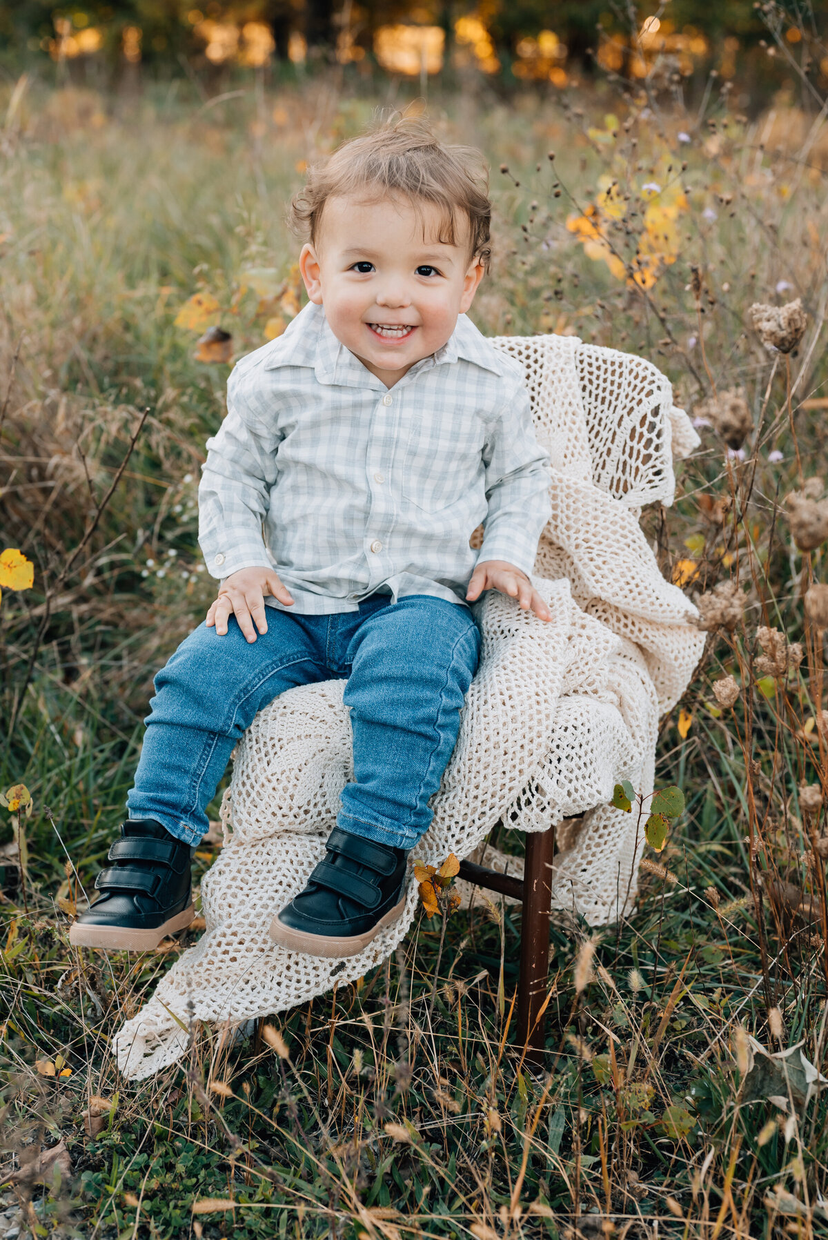 toddler-smiling-golden-foliage