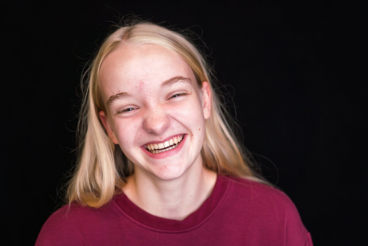 Teenage girl for laughing for school portrait, children's portrait photographer
