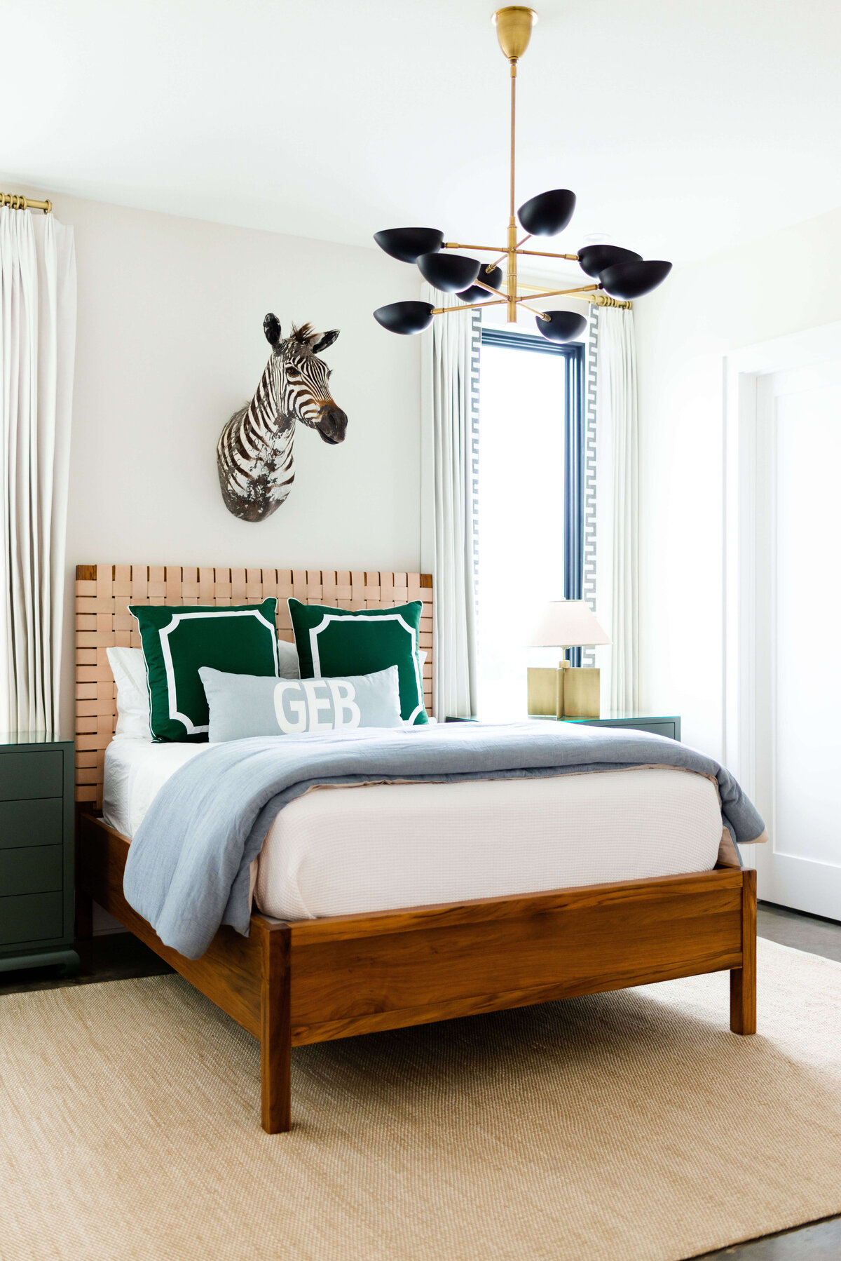 oyster creek studios building belt new build zebra bust over in bed in bedroom with wooden bedframe