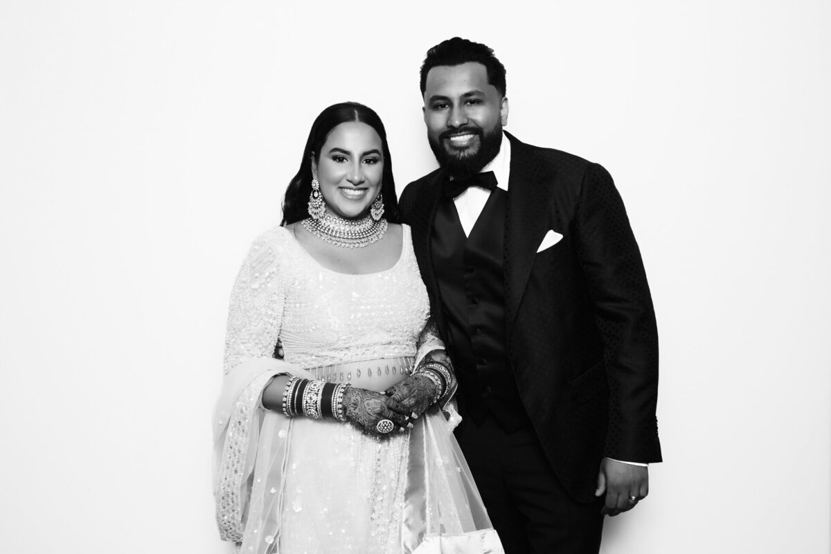 couple-using-black-and-white-photo-booth-rental