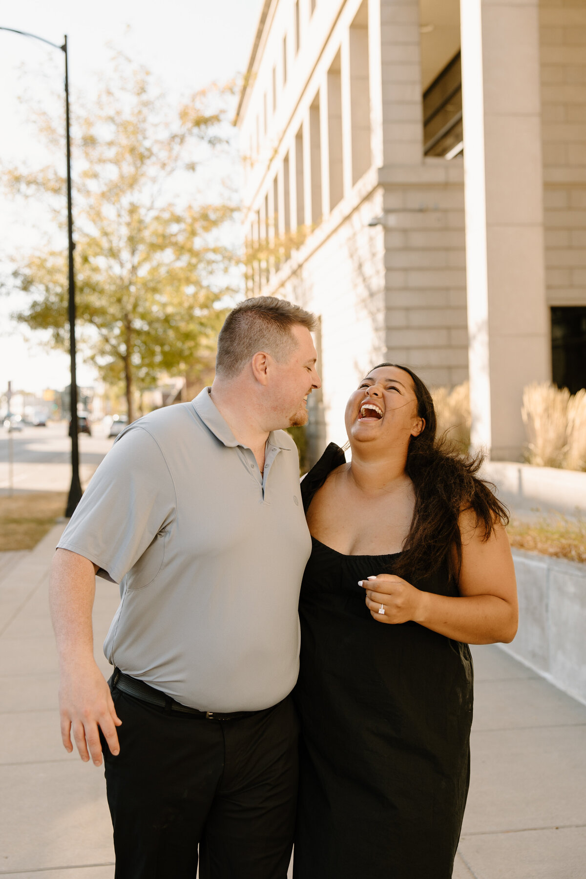 laughing couple engaged