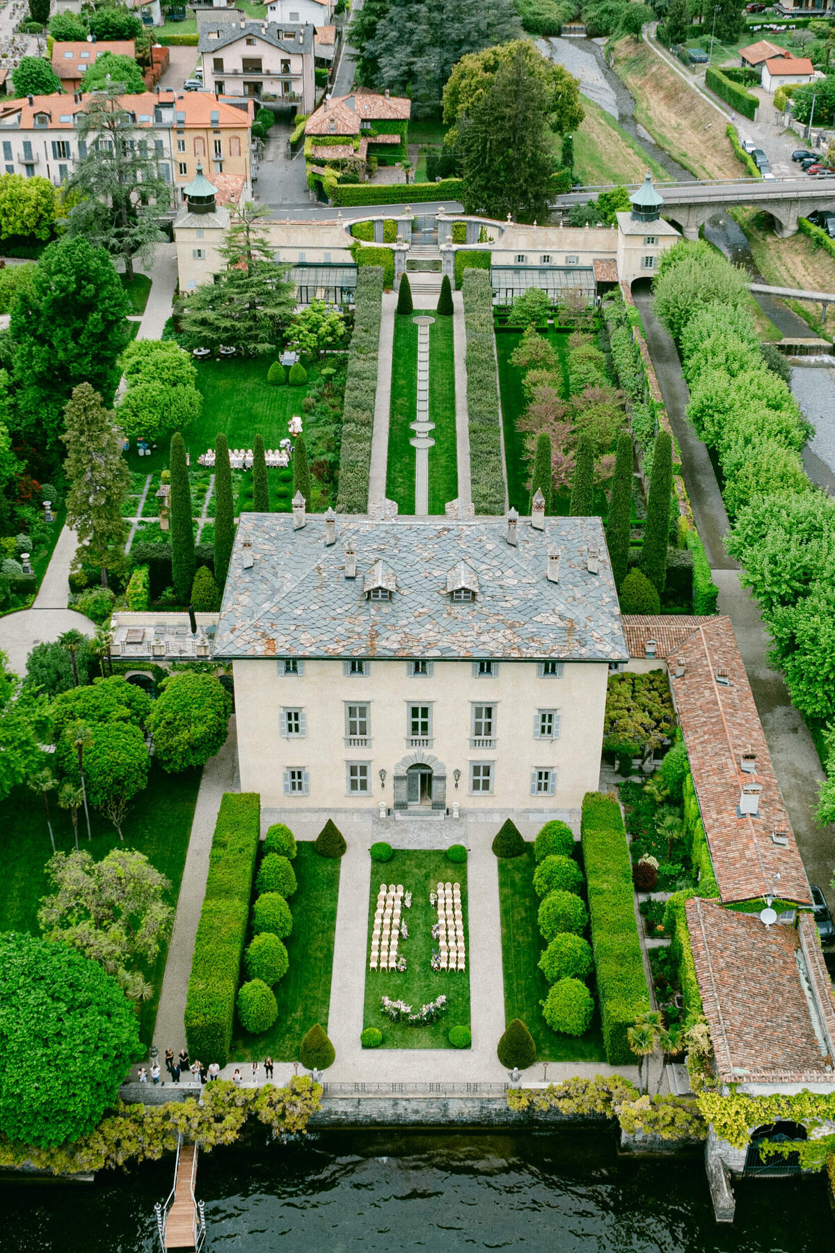 A wedding aerial drone photo of the wedding venue villa balbiano on lake como in italy