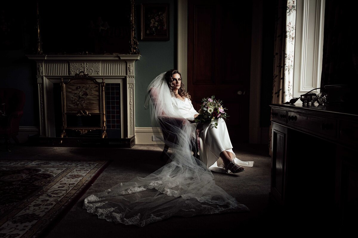 Bride in a chair with window light