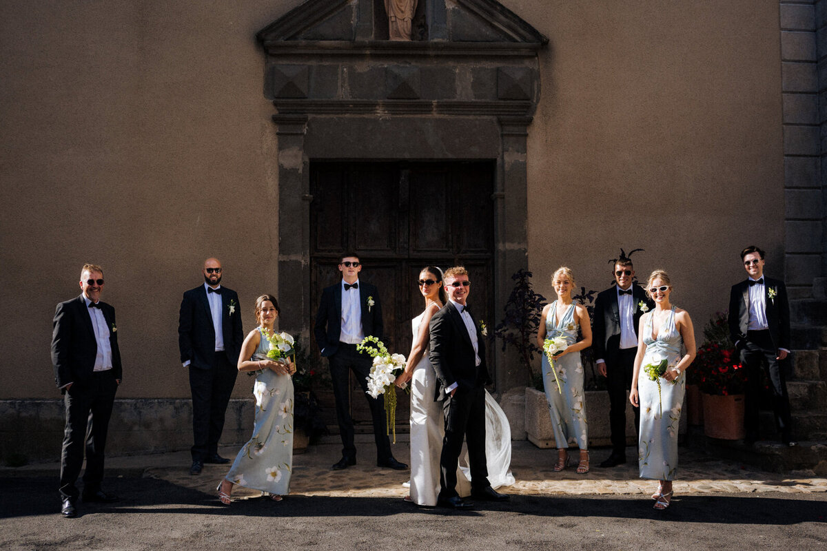 bride-church-exit-white-orchid-wedding-bouquet-france6