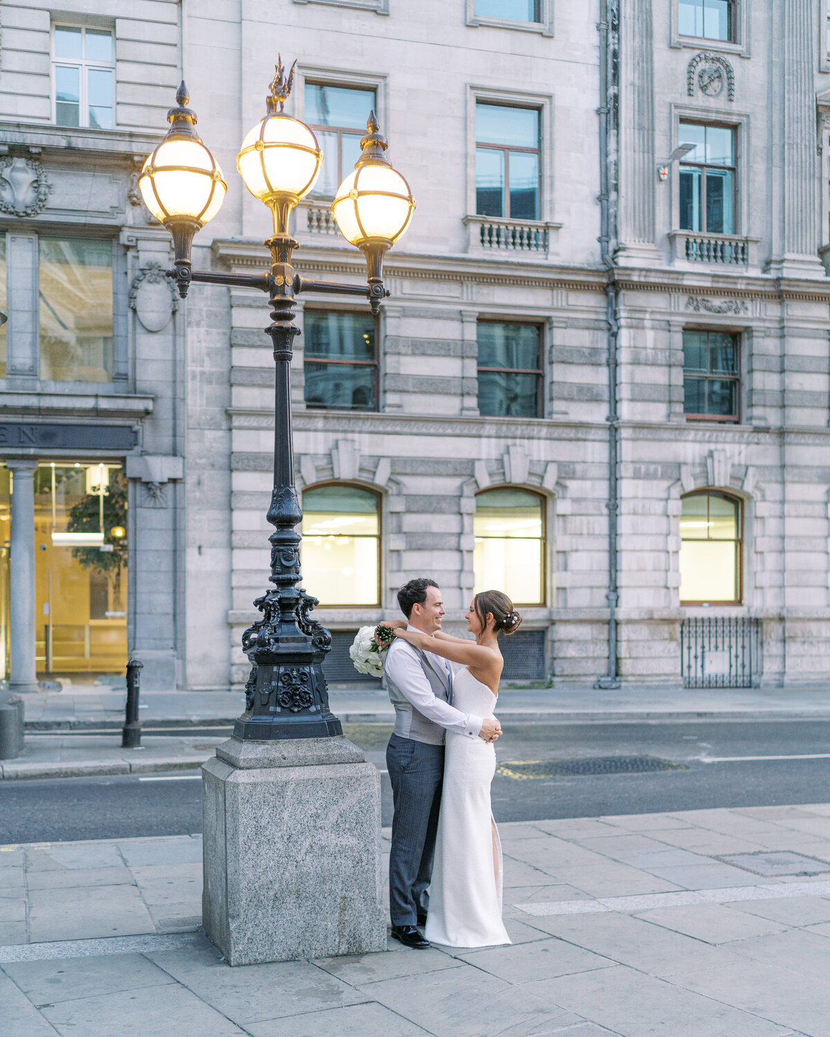 Bride and groom in London for golden hour wedding portraits