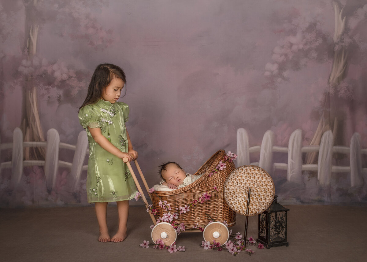 Newborn and sibling photoshoot in  a creative setup in Ottawa Ontario