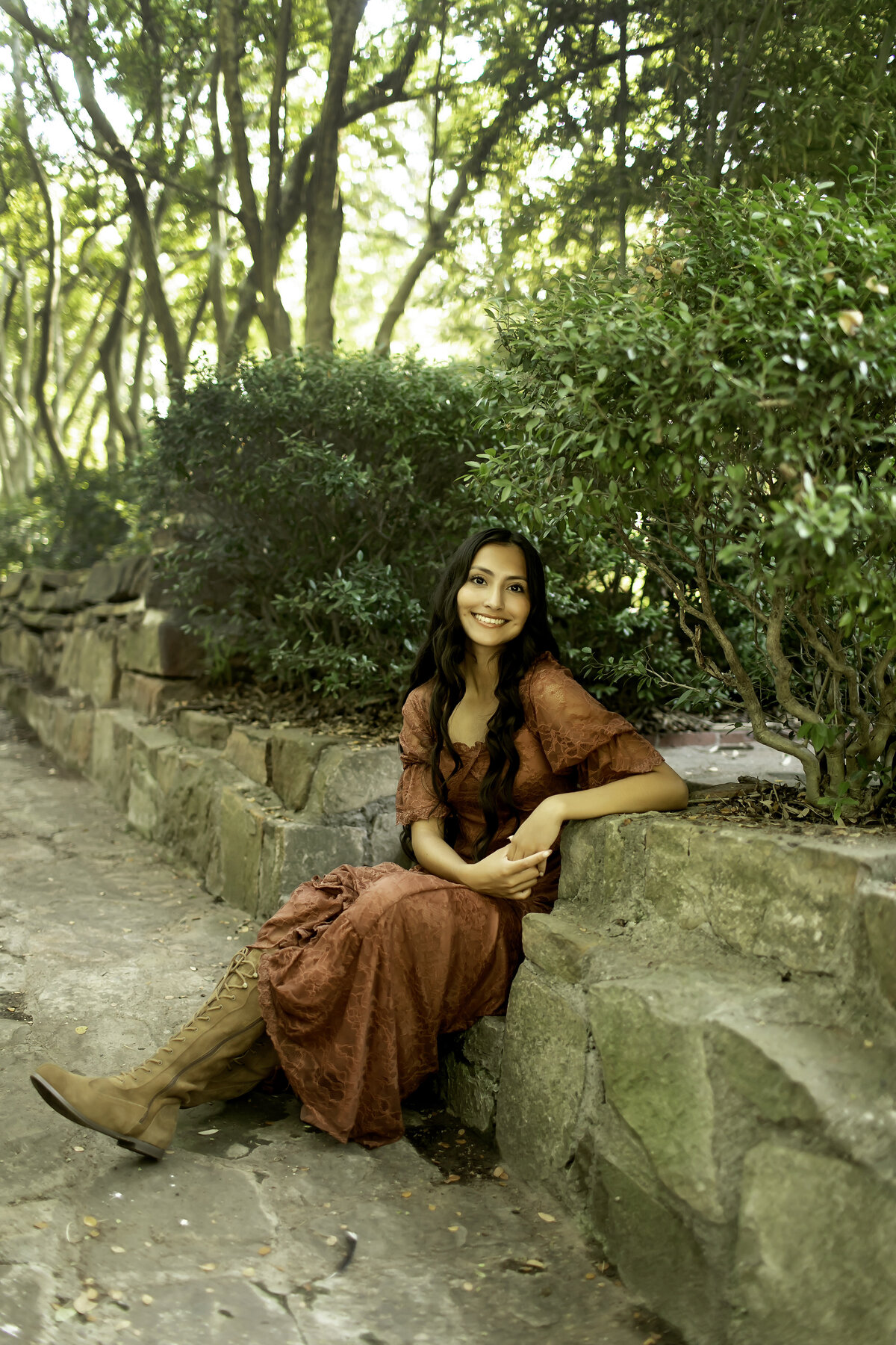 The beauty of Chandor Gardens in Weatherford serves as the perfect backdrop for a high school senior, capturing both elegance and excitement for the next chapter