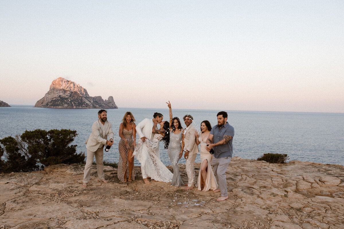 Champagne shower after wedding near Es Vedra on Ibiza