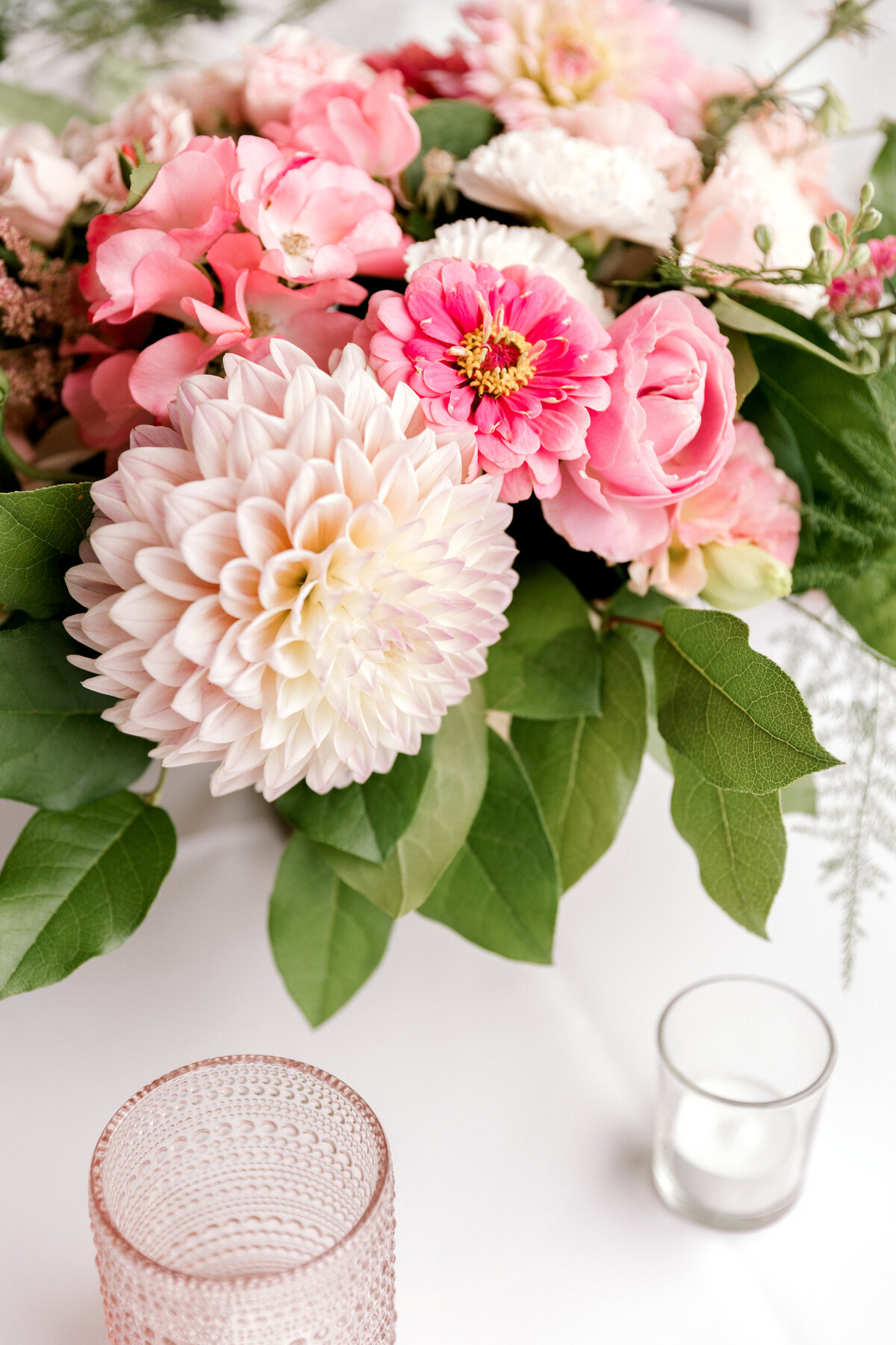 Wedding Centerpiece with a mix of pink florals