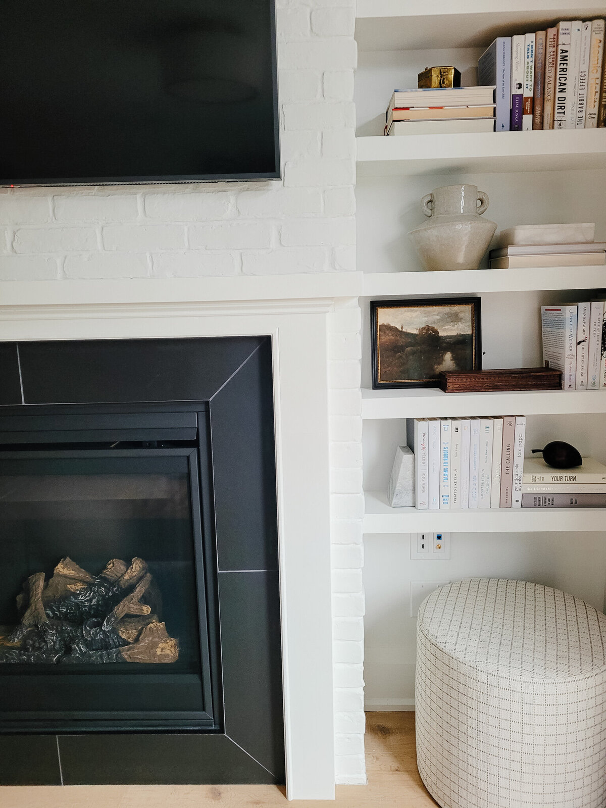 White Brick Fireplace with custom shelves